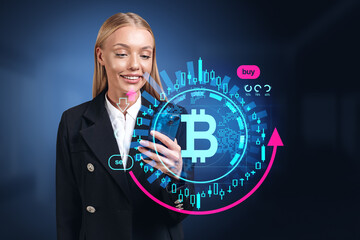Businesswoman with smartphone, bitcoin hologram with candlestick