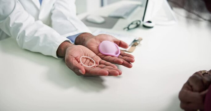 Gynecologist Consulting Woman On Diaphragm Contraception