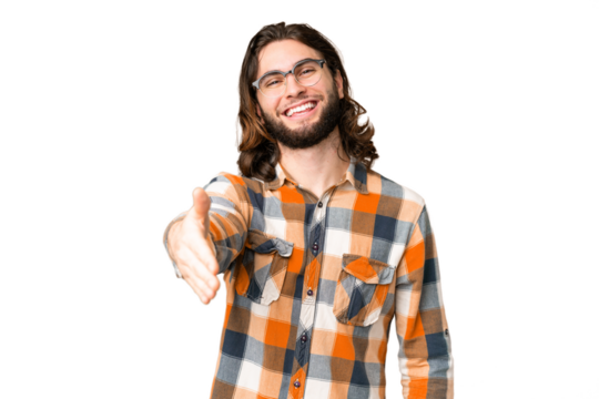 Young handsome man over isolated chroma key background shaking hands for closing a good deal