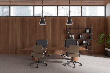 Wooden office interior with pc computer on table and shelf with panoramic window