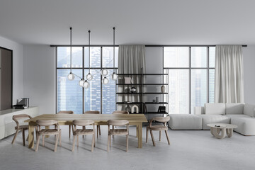 Front view on bright studio room interior with sofa