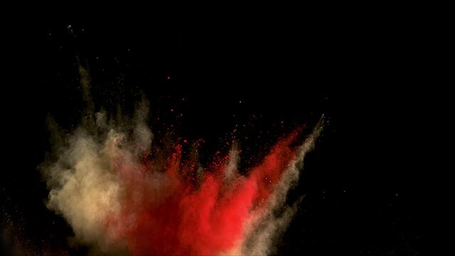 Super slow motion of coloured powder explosion isolated