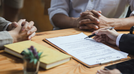 lawyer working with contract agreement at table office, law and justice concept, Selective focus.