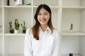 Portrait of smiling asian businesswoman.