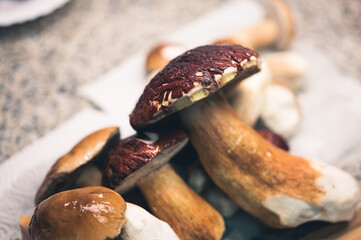 Clooseup delicious mushroom on a kitchen board.