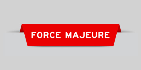 Red color inserted label with word force majeure on gray background