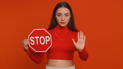 Serious pretty woman say No, hold inscription text red No stop danger sign, warning of finish,...