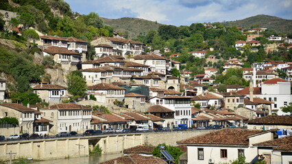 Fototapeta na wymiar Berat is a city on the Osum River in central Albania. It is famous for the white Ottoman houses and for the castle of Berat, a huge complex on the hill where some citizens now reside. inside its walls