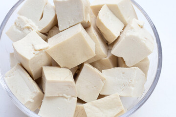 White tofu in glass bowl