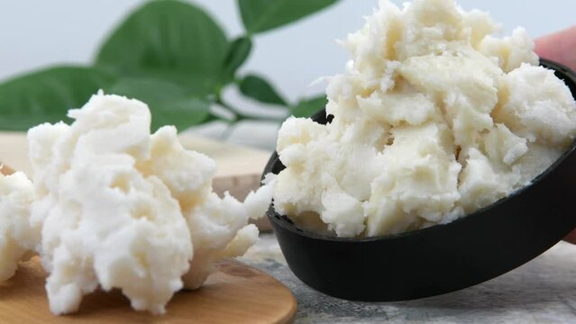 Shea butter on light background, unrefined, close up