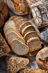 Assorted bakery products including loafs of bread and rolls