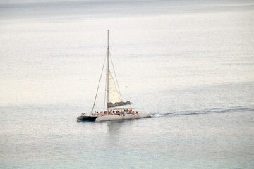 sightseeing catamaran with many tourists