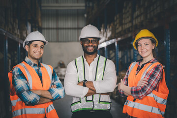 Portrait of smiling group worker in safety arms cross working at warehouse, Logistic inventory teamwork concept