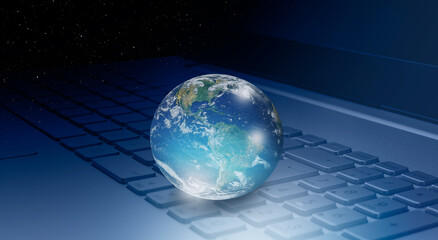 Glass globe on laptop keyboard with many stars "Elements of this image furnished by NASA "