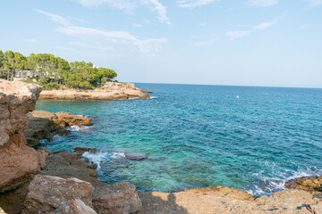 calafatc cove with crystal clear and quiet waters located in tarragona