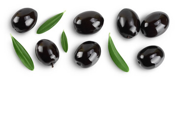 Black olives with leaves isolated on a white background with full depth of field. Top view with...