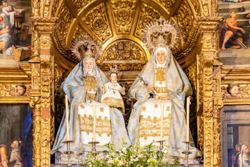 Obraz premium Image of Santa Ana (Saint Anne), the Virgin and Child Jesus Christ, Inside the parish of the neighborhood of Triana, Church of Santa Ana, considered the Cathedral of Triana, Seville, Andalusia, Spain