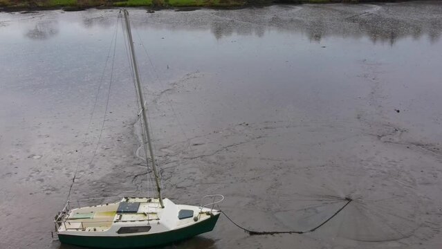 Boat Stuck on Sandbar in Low Flow River.Ireland. Cork. Aerial Drone.
