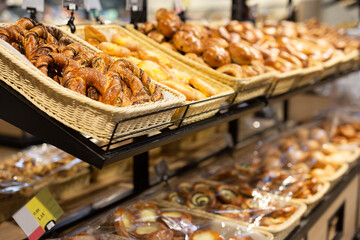 delicious bavarian pretzel in baskets in bakery