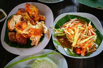 Papaya salad and grilled chicken is a popular dish in Asia.