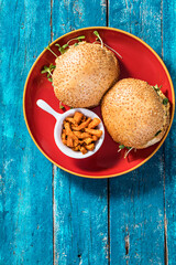 pumpkin burger on a blue wooden table