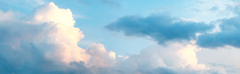 Sunrise in blue clouds, banner.