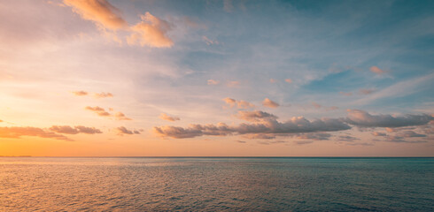 Panoramic sea skyline beach. Amazing sunrise beach landscape. Panorama of tropical beach seascape...