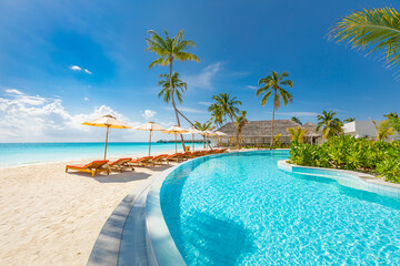 Tranquil landscape, swimming pool blue sea sky clouds, soft white sand. Tropical resort in Maldives. Fantastic relax peaceful vibes, chairs, beds under umbrellas and palm trees. Luxury travel vacation