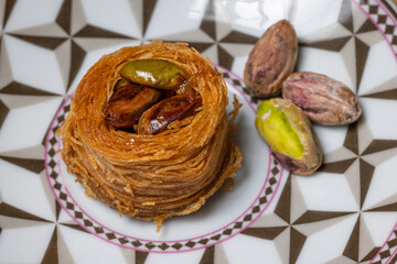 Close up of angel hair nest with caramelized pistachios