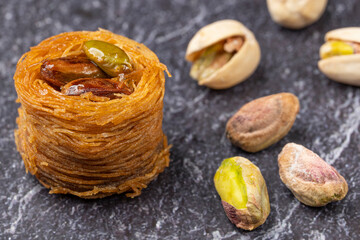 Close up of angel hair nest with caramelized pistachios