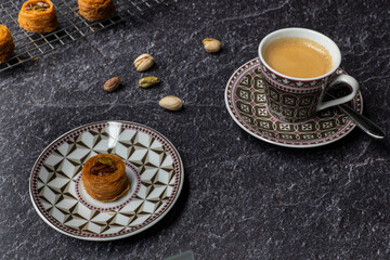 Angel hair nest with caramelized pistachios served with a cup of espresso