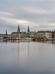 Hamburg city centre on lake Binnenalster after sunset during christmas, Germany