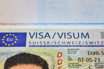 Close up of a Schengen visa  Switzerland ,Schengen is a permit to enter the country. for a short visit to the area comprising the 27 European states