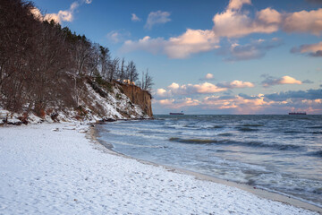 Beautiful landscape of the cliff in Gdynia Orłowo in snowy winter, Baltic Sea. Poland