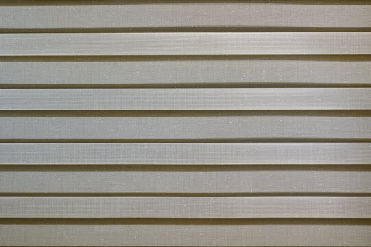 close up of material texture background with stripes and holes