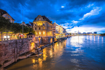 Fototapeta na wymiar Basel historic waterfront and Rhine river architecture evening view