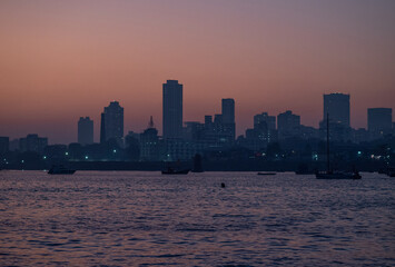 Mumbai coast line with taj mahal palace hotel and gateway of India.