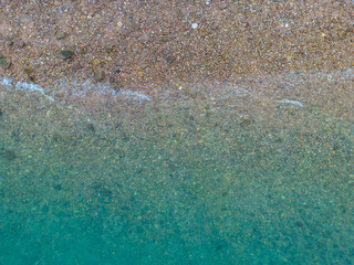 Aerial view sea wave beach with walk way