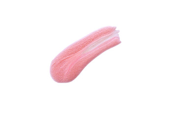 Close-up smear of pink glittery nail polish or lip gloss isolated on white background. Brush stroke. Cosmetics, makeup, body care