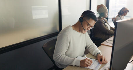 Call center, consulting and communication with businessman writing for telemarketing, customer...