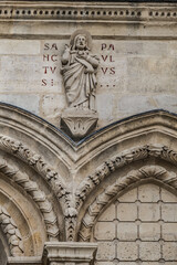 Fragments of the facade of Basilica of Saint-Denis (Basilique royale de Saint-Denis, from 1144) - former medieval abbey church in city of Saint-Denis, a northern suburb of Paris. France.