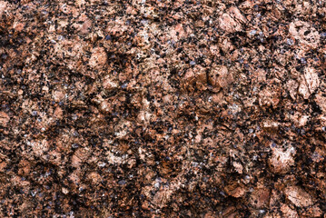 Texture of natural stone with irregularities. Background from a stone with a vignette. Wall