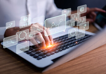 Big data analytics and business intelligence concept with chart and graph icons on a digital screen interface and a businessman use tablet in background. technology and people in life style.