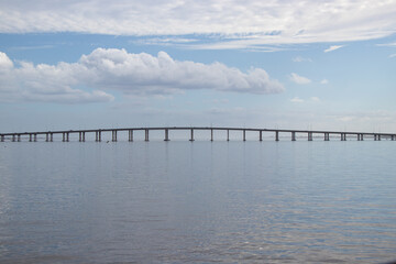Causeway over a river on a cloudy day