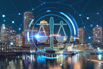 City view panorama of Boston Harbor and Seaport Blvd at night time, Massachusetts. Financial downtown. Glowing hologram legal icons. The concept of law, order, regulations and digital justice.