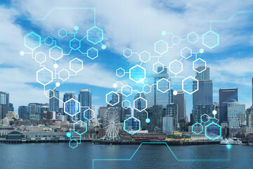 Seattle skyline with waterfront view. Skyscrapers of financial downtown at day time, Washington, USA. Decentralized economy. Blockchain, cryptography and cryptocurrency concept, hologram