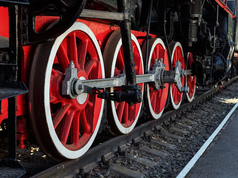 large metal wheels of an old train