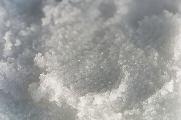 Macro photo of the surface of the salt in the bowl (abstract, textured background)