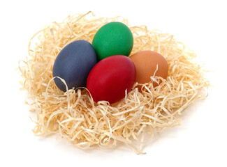 Fototapeta na wymiar Easter eggs in the nest.
