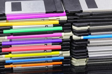 old floppy disks used to save data from early personal computers in the 80s and 90s